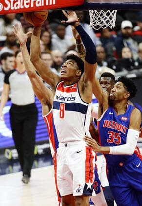 Basketball: Wizards-Pistons NBA, Basketball Herren, USA game Rui Hachimura (8) of the Washington Wizards attempts to shoot under pressure from the Detroit Pistons Christian Wood (35) during the first quarter of an NBA game on Nov. 4, 2019, in Washington. 