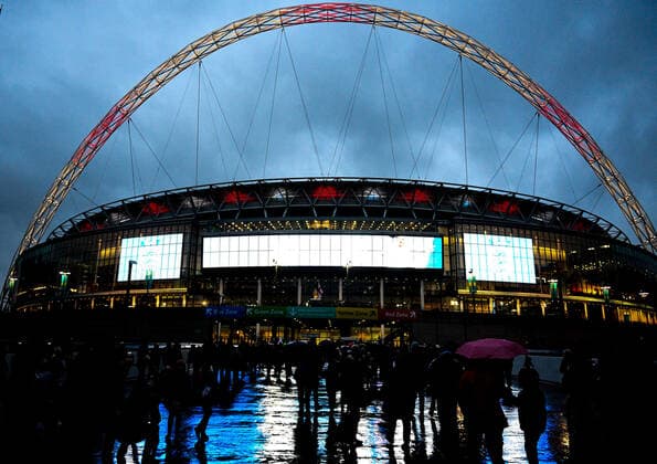 9th November 2019; Wembley Stadium, London, England; International Womens Football Friendly, England women versus Germany women; fans arrive in the heavy rain at Wembley Stadium - Editorial Use  ActionPlus12185903 SimonxWest