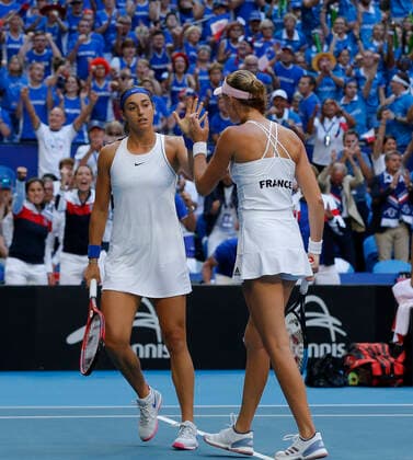 10th November 2019; RAC Arena, Perth, Western Australia, Australia; Fed Cup by BNP Paribas Final Tennis, Australia versus France; Kristina Mladenivic and Caroline Garcia of France high five during the doubles against Australia  ActionPlus12186338 DavidxWoodley
