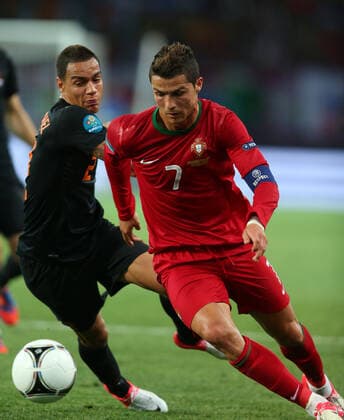 Gregory Van Der Wiel & Cristiano Ronaldo Portugal V Holland Euro 2012 Euro 2012 Portugal V Holland Metalist Stadium, Kharkiv, Ukraine 17 June 2012  Copyright: MaryxEvansxAllstarxStewartxKendall 12536536 editorial use only