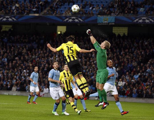Joe Hart & Mats Hummels Manchester City V Borussia Dortmund Manchester City V Borussia Dortmund Uefa Champions League Group D Etihad Stadium, Manchester, England 03 October 2012  Copyright: MaryxEvansxAllstarxRichardxSellers 12542224 editorial use only