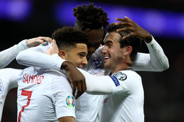14th November 2019; Wembley Stadium, London, England; European Championships 2020 Qualifier, England versus Montenegro; Tammy Abraham of England celebrates with Jadon Sancho and Ben Chilwell after he scores for 7-0 in the 84th minute - Editorial Use  ActionPlus12187927 ShaunxBrooks
