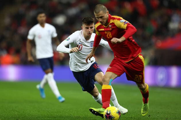 14th November 2019; Wembley Stadium, London, England; European Championships 2020 Qualifier, England versus Montenegro; Mason Mount of England closes down Aleksandar Sofranac of Montenegro - Editorial Use  ActionPlus12187945 ShaunxBrooks