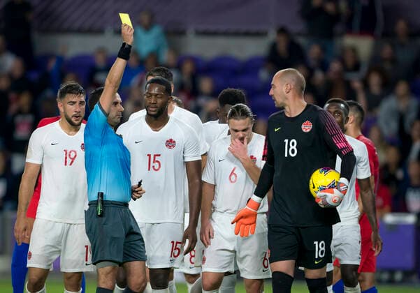 ORLANDO, FL - NOVEMBER 15: Canada goalkeeper Milan Borjan (18) receive a foul and yellow card during the CONCACAF Nations League soccer match between the Canada and United States on November 15, 2019 at Explorer Stadium in Orlando, FL. (Photo by Andrew Bershaw Icon Sportswire) SOCCER: NOV 15 CONCACAF Nations League - USA v Canada Icon1911150351