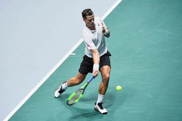 MADRID, SPAIN - NOVEMBER 19: Vasek Pospisil of Canada in action during the Group F match between USA and Canada during Davis Cup by Rakuten Madrid Finals 2019 at Caja Magica on November 19, 2019 in Madrid, Spain. (Photo by Corinne Dubreuil Kosmos Tennis) Cordon Press