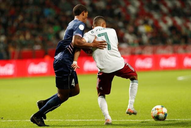 Mexican Orbelin Pineda (R) vies for the vall with Roger Lee (L) of Bermuda during a match of the group stage of the League of Nations of the Concacaf between Mexico and Bermuda, at the Nemesio Diez stadium in Toluca, Mexico, 19 November 2019. Mexico vs. Bermuda !ACHTUNG: NUR REDAKTIONELLE NUTZUNG!  Copyright: xJorgexNúnezx MEX9275 20191120-637098209219107497