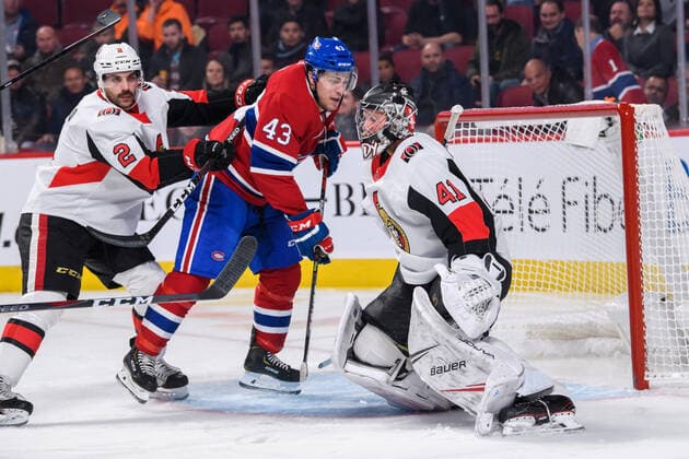 MONTREAL, QC - NOVEMBER 20: Dylan DeMelo (2) of the Ottawa Senators checks Jordan Weal (43) of the Montreal Canadiens in front of Craig Anderson (41) of the Ottawa Senators during the second period of the NHL, Eishockey Herren, USA game between the Ottawa Senators and the Montreal Canadiens on November 20, 2019, at the Bell Centre in Montreal, QC (Photo by Vincent Ethier Icon Sportswire) NHL: NOV 20 Senators at Canadiens Icon1911201236