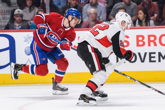 MONTREAL, QC - NOVEMBER 20: Max Domi (13) of the Montreal Canadiens and Nikita Zaitsev (22) of the Ottawa Senators race for the puck during the second period of the NHL, Eishockey Herren, USA game between the Ottawa Senators and the Montreal Canadiens on November 20, 2019, at the Bell Centre in Montreal, QC (Photo by Vincent Ethier Icon Sportswire) NHL: NOV 20 Senators at Canadiens Icon1911201604