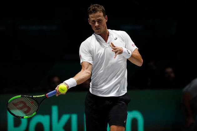 Vasek Pospisil of Canada plays a forehand against John Millman of Australia during Day 4 of the 2019 Davis Cup at La Caja Magica on November 21, 2019 in Madrid, Spain.  (20191121826)