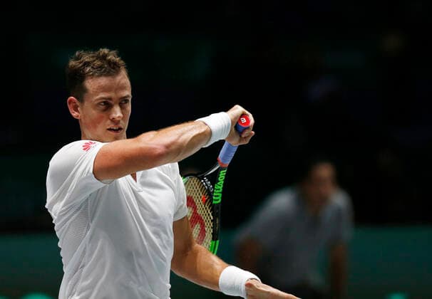 Vasek Pospisil of Canada plays a forehand against John Millman of Australia during Day 4 of the 2019 Davis Cup at La Caja Magica on November 21, 2019 in Madrid, Spain.  (20191121830)