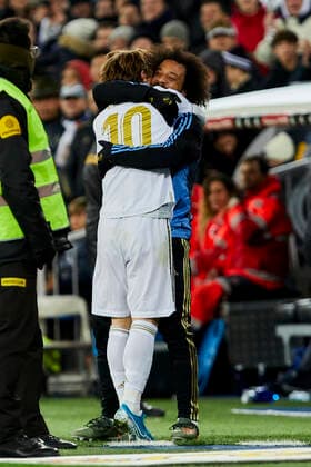 Luka Modric (L) and Marcelo Vieira (R) of Real Madrid celebrate goal during La Liga match between Real Madrid and Real Sociedad at Santiago Bernabeu Stadium in Madrid, Spain. November 23, 2019.  (201911230083)