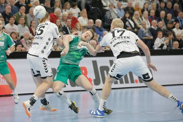 1.Handball Bundesliga THW Kiel - SC DHfK Leipzig, Kiel, 24.11.2019 Luca Witzke ( Leipzig, 7 ) im Wurf gegen Lukas Nilsson ( Kiel, 65 ) und Patrick Wiencek ( Kiel, 17 ) Copyright: xBEAUTIFULxSPORTS DRPx