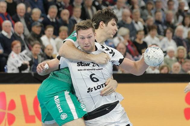1.Handball Bundesliga THW Kiel - SC DHfK Leipzig, Kiel, 24.11.2019 Harald Reinkind ( Kiel, 6 ) im Zweikampf gegen Marko Mamic ( Leipzig, 22 ) Copyright: xBEAUTIFULxSPORTS DRPx