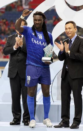 November 24, 2019, Saitama, Japan - Saudi Arabia s Al Hilal SFC Bafetimbi Gomis receives the trophy as the team won the AFC Champions League at the final in Saitama, suburban Tokyo on Sunday, November 24, 2019. Al Hilal SFC defeated Urawa Reds 2-0 in the second match of the ACL finals. Noxthirdxpartyxsales  (117237837)