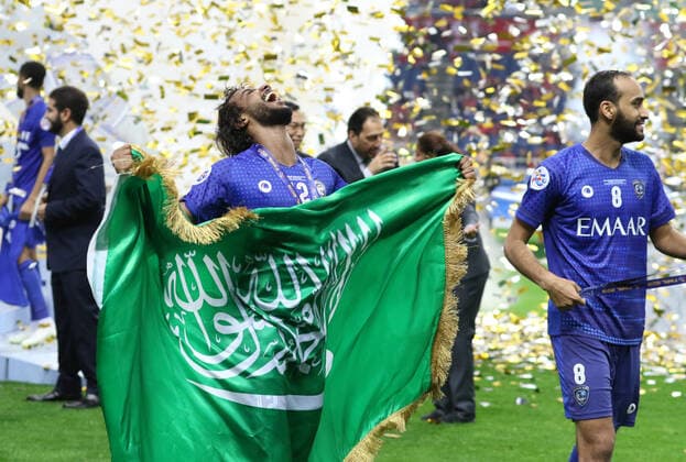 November 24, 2019, Saitama, Japan - Saudi Arabia s Al Hilal SFC members Yasir Alshahrani (L) and Abdullah Otaf (R) celebrate their victory of AFC Champions League at the final in Saitama, suburban Tokyo on Sunday, November 24, 2019. Al Hilal SFC defeated Urawa Reds 2-0 in the second match of the ACL finals. Noxthirdxpartyxsales  (117237846)