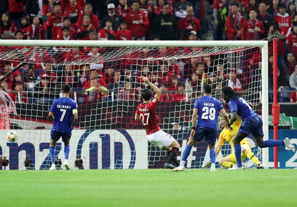 November 24, 2019, Saitama, Japan - Saudi Arabia s Al Hilal SFC bafetimbi Gomis (R) scores a goal against Urawa Reds at the AFC Champions League final in Saitama, suburban Tokyo on Sunday, November 24, 2019. Al Hilal SFC defeated Urawa Reds 2-0 in the second match of the ACL finals. Noxthirdxpartyxsales  (117238030)
