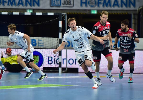 28.11.2019 - Handball - 1. Bundesliga Liqui Moly HBL - Saison 2019 2020 - 15.Spieltag: HC Erlangen Metropolregion Nürnberg HCE - THW Kiel - OGo - Nikola Bilyk (53, THW Kiel ) Jubel Freude Petter Overby ( 9, HC Erlangen HCE ) Quentin Minel (34, HC Erlangen HCE )