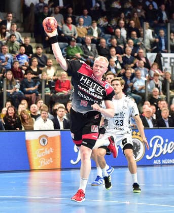 28.11.2019 - Handball - 1. Bundesliga Liqui Moly HBL - Saison 2019 2020 - 15.Spieltag: HC Erlangen Metropolregion Nürnberg HCE - THW Kiel - OGo - Sebastian Firnhaber (18, HC Erlangen HCE )