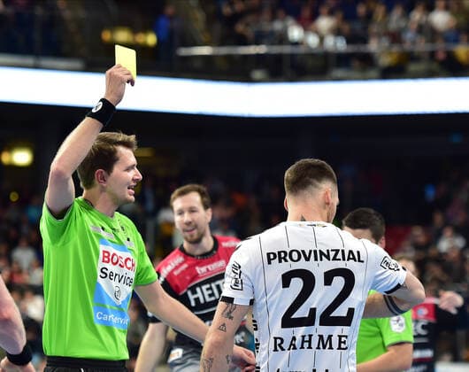 28.11.2019 - Handball - 1. Bundesliga Liqui Moly HBL - Saison 2019 2020 - 15.Spieltag: HC Erlangen Metropolregion Nürnberg HCE - THW Kiel - OGo - Ole Rahmel (22, THW Kiel ) gelbe Karte Gelb
