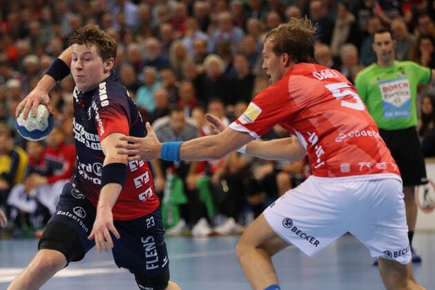 SG Flensburg-Handewitt vs Bergischer HC, LIQUI-MOLY Handball Bundesliga, 28.11.19; Flensburg Goran Soegard Johannsessen (SG Flensburg-Handewitt, 23) gegen Max Darj (Bergischer HC, 05) Copyright: xBEAUTIFULxSPORTS MarioxM.xKobergx