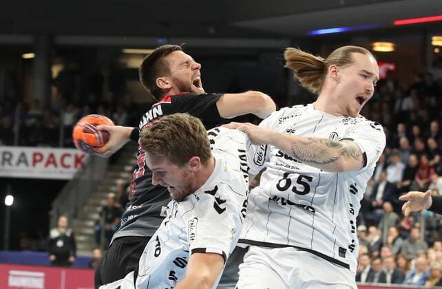 28.11.2019 - Handball - 1. Bundesliga LIQUI MOLY HBL - Saison 2019 2020 - 15. Spieltag: HC Erlangen Metropolregion Nürnberg HCE - THW Kiel - DaMa - Magnus Landin Jacobsen (7, THW Kiel ) Sime Ivic (19, HC Erlangen HCE ) Lukas Nilsson (65, THW Kiel )
