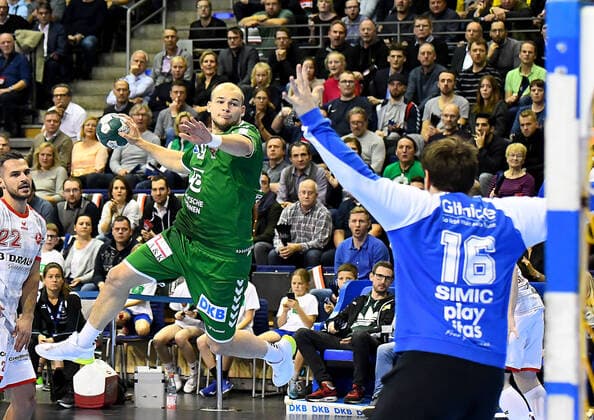 28.11.2019, xlakx, Handball Bundesliga, Fuechse Berlin - MT Melsungen emspor, v.l. zum Sprungwurf Paul Drux(Fuechse Berlin 95),Nebojsa Simic (MT Melsungen 16) Berlin