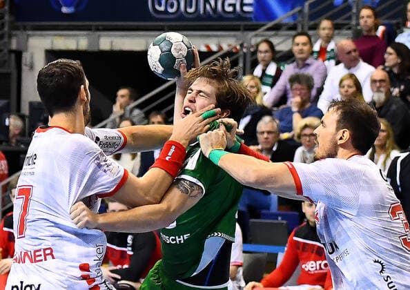 28.11.2019, xlakx, Handball Bundesliga, Fuechse Berlin - MT Melsungen emspor, v.l. am Ball Jacob Tandrup Holm(Fuechse Berlin 6),Kai Haefner (MT Melsungen 34) Berlin