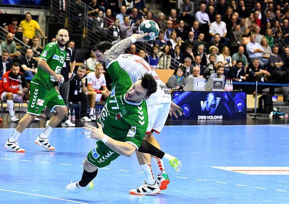 28.11.2019, xlakx, Handball Bundesliga, Fuechse Berlin - MT Melsungen emspor, v.l. zum Sprungwurf Johan Koch(Fuechse Berlin 77),Felix Danner (MT Melsungen 17) Berlin
