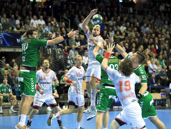 GER, DHB, 1.HBL, FUECHSE BERLIN VS. Melsungen 28.11.2019, Max Schmeling Halle, Berlin, GER, DHB, 1.HBL, FUECHSE BERLIN VS. Melsungen, DHB regulations prohibit any use of photographs as image sequences and or quasi-video im Bild Jakov Gojun (Fuechse Berlin 10) , Fabian Wiede (Fuechse Berlin 3), Julius Kuehn(MT Melsungen 5), Jeffrey Boomhouwer (MT Melsungen 19)