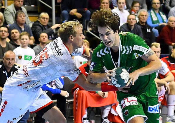 28.11.2019, xlakx, Handball Bundesliga, Fuechse Berlin - MT Melsungen emspor, v.l.Zweikampf Lasse Mikkelsen (MT Melsungen 15),Jacob Tandrup Holm(Fuechse Berlin 6) Berlin