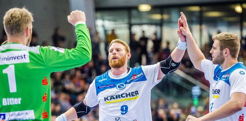 Siegerpose: Spaeth, Manuel (TVB Stuttgart 9) Bitter, Johannes (TVB Stuttgart 1) Roethlisberger, Samuel (TVB Stuttgart 17) TVB 1898 Stuttgart - HSG Nordhorn Lingen HBL LIQUI MOLY 1.Handball-BundesligaSCHARRena Stuttgart Baden-Wuerttemberg Deutschland . 01.12.19 Handball 15. Spieltag , Baden Wuerttemberg Deutschland