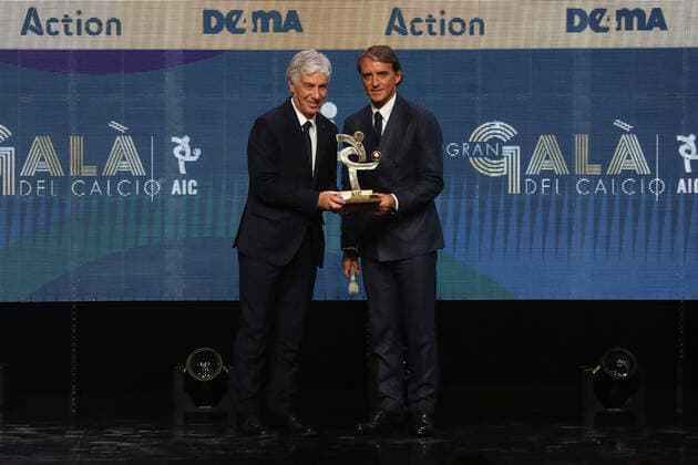 Gian Piero Gasperini Head coach of the Year 2019 receives his award from Roberto Mancini at the The Italian Footballers Association Grand Gala of Football at the Megawatt Court, Milan. Picture date: 2nd November 2019. Picture credit should read: Jonathan Moscrop Sportimage EDITORIAL USE ONLY. No use with unauthorised audio, video, data, fixture lists, club league logos or live services. Online in-match use limited to 120 images, no video emulation. No use in betting, games or single club league player publications. SPI-0345-0027