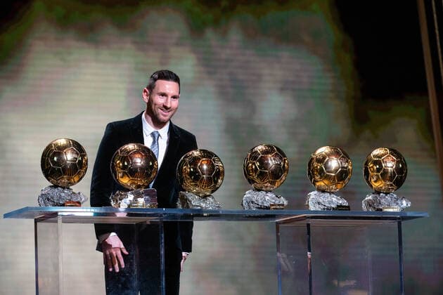 (191203) -- PARIS, Dec. 3, 2019 (Xinhua) -- Barcelona s Argentinian forward Lionel Messi poses with the trophies during the Ballon d Or 2019 awards ceremony at the Theatre du Chatelet in Paris, France, Dec. 2, 2019. (Photo by Aurelien Morissard Xinhua) (SP)FRANCE-PARIS-SOCCER-BALLON D OR 2019 AWARDS 