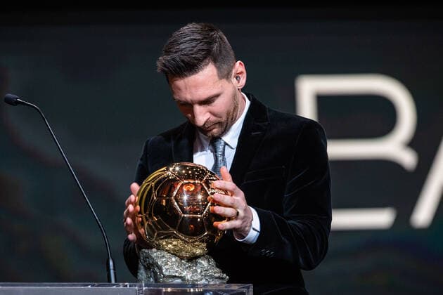 (191203) -- PARIS, Dec. 3, 2019 (Xinhua) -- Barcelona s Argentinian forward Lionel Messi reacts with the trophy during the Ballon d Or 2019 awards ceremony at the Theatre du Chatelet in Paris, France, Dec. 2, 2019. (Photo by Aurelien Morissard Xinhua) (SP)FRANCE-PARIS-SOCCER-BALLON D OR 2019 AWARDS 