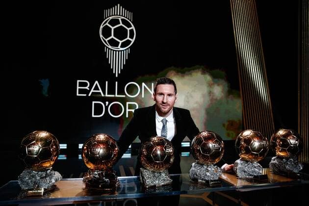 (191203) -- BEIJING, Dec. 3, 2019 (Xinhua) -- The Men s 2019 Ballon d Or winner Barcelona forward Lionel Messi poses with his six Ballon d Or trophies he won in his career so far during the ceremony at the Theatre du Chatelet in Paris, France, Dec. 2, 2019. (Photo by Aurelien Morissard Xinhua) XINHUA PHOTOS OF THE DAY 