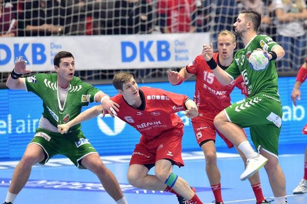 Fabian Wiede (Fuechse Berlin) (am Ball), Julius Kuehn (MT Melsungen) (M), Lasse Mikkelsen (MT Melsungen) (hinten) , GER, MT Melsungen - Fuechse Berlin, Handball, DHB Pokal, 03.12.2019, GER, MT Melsungen - Fuechse Berlin, Handball, DHB Pokal Maenner, 03.12.2019 Kassel Copyright: xSippel xEibner-Pressefotox EP_rsl