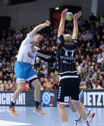 BAU 03.12.2019 Stuttgart Handball TVB Stuttgart vs. THW Kiel, v.l. Adam Lönn (TVB), Patrick Wiencek (Kiel)