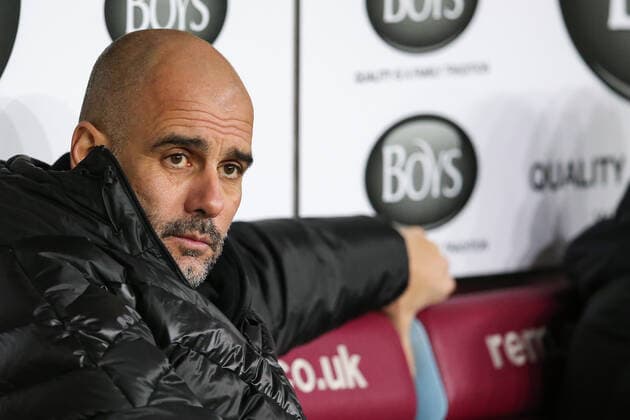 BURNLEY, ENGLAND - DECEMBER 03: Pep Guardiola of Manchester City sits in the dugout before the Premier League match between Burnley FC and Manchester City at Turf Moor on December 3, 2019 in Burnley, United Kingdom. SPO, SOC, FOC 
