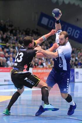 2.Bundesliga Handball VfL Luebeck-Schwartau - HSC 2000 Coburg 06.12.2019, Hansehalle Luebeck, GER, 2.Bundesliga Handball VfL Luebeck-Schwartau - HSC 2000 Coburg im Bild picture shows Jan Schult VfL Luebeck-Schwartau im Zweikampf mit Marcel Timm (HSC 2000 Coburg)