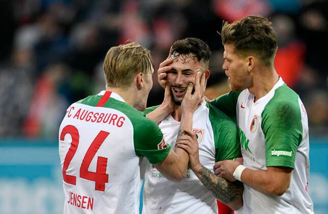 Bilder des Jahres 2019, Sport 12 Dezember Sport Themen der Woche KW49 Sport Bilder des Tages TOR zum 1:1 Marco Richter FC Augsburg FCA Torjubel mit Fredrik Jensen FC Augsburg (links) FC Augsburg FCA vs 1. FSV Mainz 05 07.12.2019 DFL REGULATIONS PROHIBIT ANY USE OF PHOTOGRAPHS AS IMAGE SEQUENCES AND OR QUASI-VIDEO FC Augsburg FCA vs 1. FSV Mainz 05 *** TOR to 1 1 Marco Richter FC Augsburg FCA cheering goal with Fredrik Jensen FC Augsburg left FC Augsburg FCA vs. 1 FSV Mainz 05 07 12 2019 DFL REGULATIONS PROHIBIT ANY USE OF PHOTOGRAPHS AS IMAGE SEQUENCES AND OR QUASI VIDEO FC Augsburg FCA vs. 1 FSV Mainz 05