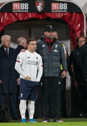 J?rgen Klopp manager of Liverpool with substitute Xherdan Shaqiri of Liverpool during the Premier League match between Bournemouth and Liverpool at the Goldsands Stadium, Bournemouth, England on 7 December 2019. Copyright: xAndyxRowlandx PMI-3237-0046