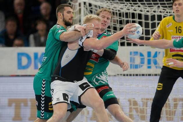 1.Handball Bundesliga THW Kiel - TSV GWD Minden, Kiel, 8.12.2019 Patrick Wiencek ( Kiel, 17 ) im Zweikampf gegen Lucas Meister ( Minden, 2) und Magnus Gullerud ( Minden, 21) Copyright: xBEAUTIFULxSPORTS DRPx