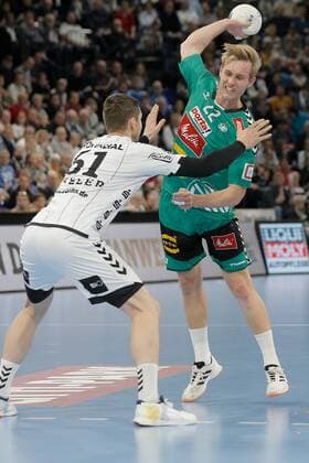 1.Handball Bundesliga THW Kiel - TSV GWD Minden, Kiel, 8.12.2019 Marian Michalczik ( Minden, 22) im Zweikampf gegen Hendrik Pekeler ( Kiel, 61 ) Copyright: xBEAUTIFULxSPORTS DRPx