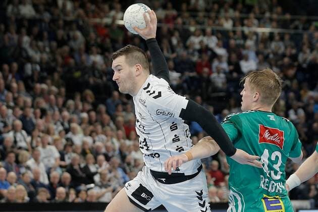 1.Handball Bundesliga THW Kiel - TSV GWD Minden, Kiel, 8.12.2019 Miha Zarabec ( Kiel, 24 ) im Zweikampf gegen Christoph Reißky ( Minden, 43) Copyright: xBEAUTIFULxSPORTS DRPx