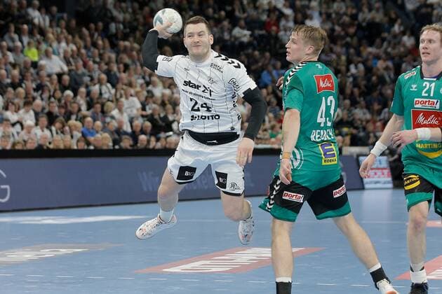 1.Handball Bundesliga THW Kiel - TSV GWD Minden, Kiel, 8.12.2019 Miha Zarabec ( Kiel, 24 ) im Zweikampf gegen Christoph Reißky ( Minden, 43) Copyright: xBEAUTIFULxSPORTS DRPx