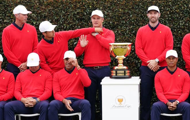 GOLF PRESIDENTS CUP, Matt Kuchar, Dustin Johnson and playing captain Tiger Woods look on as Xander Schauffele adjusts the shirt of Bryson DeChambeau as they pose for the United States team photo ahead of the 2019 Presidents Cup golf competition at the Royal Melbourne Golf Club in Melbourne, Wednesday, December 11, 2019. ( NO ARCHIVING, EDITORIAL USE ONLY, NO USE IN BOOKS WITHOUT CONSENT MELBOURNE VIC AUSTRALIA  Copyright: xSCOTTxBARBOURx 20191211001437382390