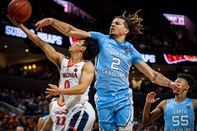 December 8, 2019: North Carolina Guard Cole Anthony (2) fouls Virginia Guard Kihei Clark (0) during the NCAA, College League, USA Basketball game between the University of North Carolina Tar Heels and University of Virginia Cavaliers at John Paul Jones Arena in Charlottesville, VA. Brian McWalters CSM NCAA Basketball 2019: UNC Tar Heels vs. Virginia Cavaliers. December 8, 2019. - ZUMAc04_ 20191123_zaf_c04_1390 Copyright: xBrianxMcwaltersx