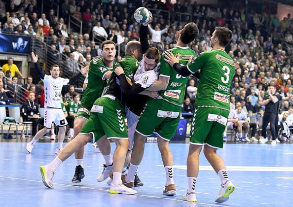 12.12.2019, xlakx, Handball Bundesliga, Fuechse Berlin - THW Kiel emspor, v.l.Mijajlo Marsenic(Fuechse Berlin 93),Paul Drux(Fuechse Berlin 95),am Ball Hendrik Pekeler (THW Kiel 61),Marko Kopljar(Fuechse Berlin 35),Fabian Wiede(Fuechse Berlin 3) Berlin