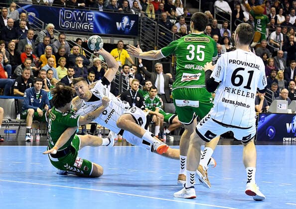 12.12.2019, xlakx, Handball Bundesliga, Fuechse Berlin - THW Kiel emspor, v.l. Jacob Tandrup Holm(Fuechse Berlin 6),am Ball zum Wurf Harald Reinkind (THW Kiel 6),Marko Kopljar(Fuechse Berlin 35),Hendrik Pekeler (THW Kiel 61) Berlin