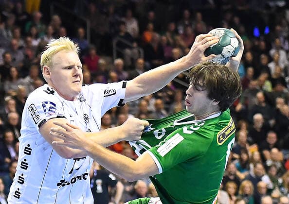 12.12.2019, xlakx, Handball Bundesliga, Fuechse Berlin - THW Kiel emspor, v.l. Zweikampf Patrick Wiencek (THW Kiel 17),Jacob Tandrup Holm(Fuechse Berlin 6) Berlin